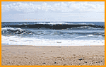 Normally, August in New Jersey is flatter than a flounder's pee-pee, so it's easy to see why East Coasters get so excited about the tropical season. Pre-Floyd fun, 1999. Photo: Aaron Chang/Swell